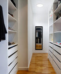 Modern walk-in closet with a large round solar light Kit