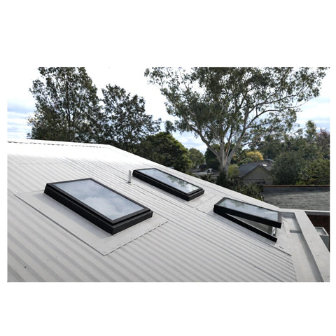 Custom-made flashing tray for roof window installation on Australian metal roof