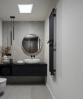 Modern bathroom with black vanity, round mirror, and solar light.