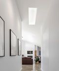Daylight-feel ceiling light designed for dark interior spaces in hallway