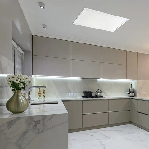 Modern kitchen with marble countertops, light gray cabinets and rectangle solar light.