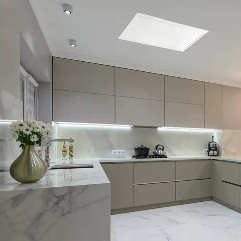 Modern kitchen with marble countertops, light gray cabinets and rectangle solar light.
